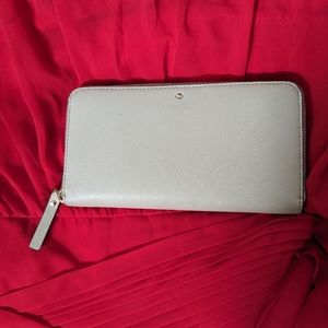 Kate Spade cream colored zip around wallet GUC